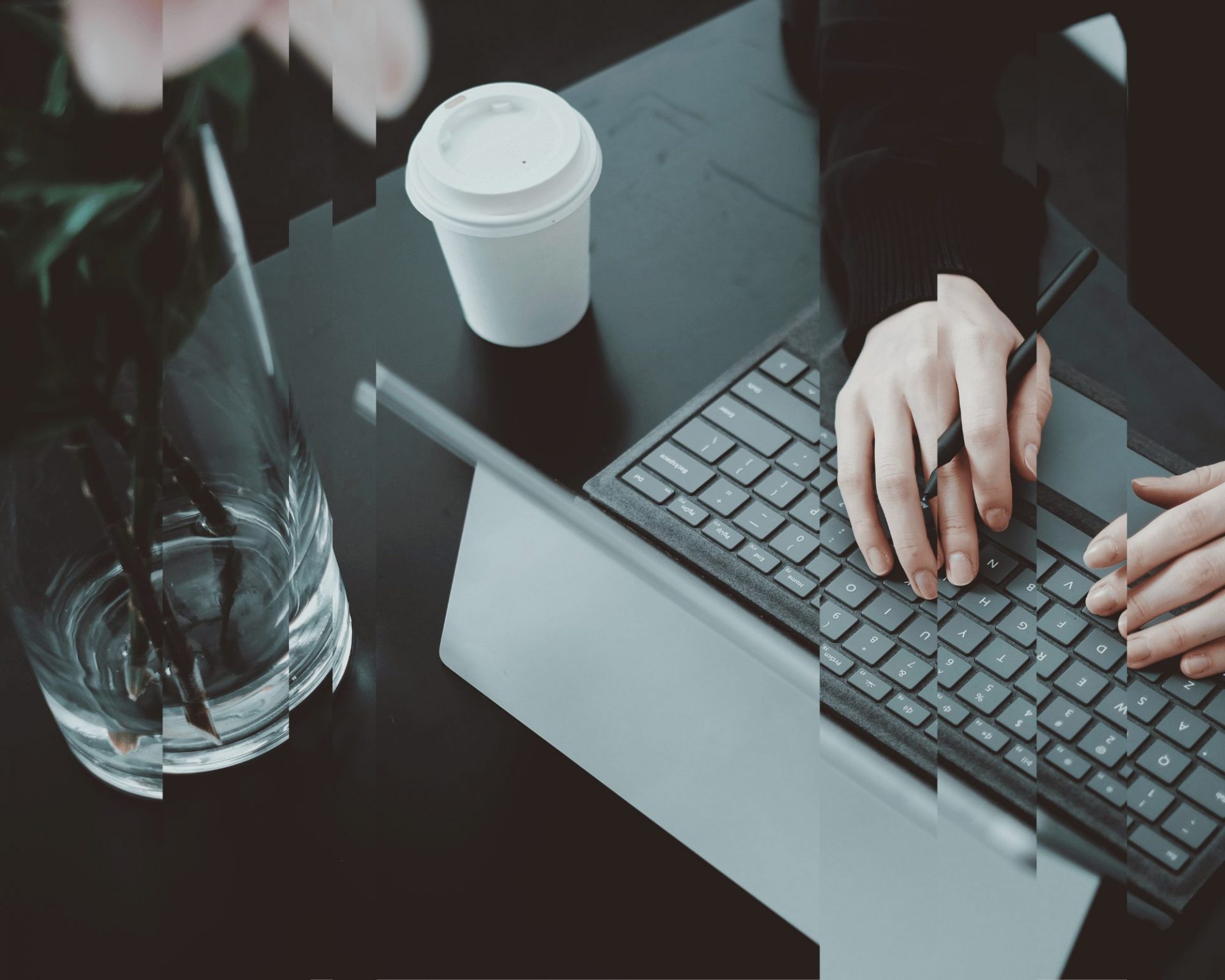 A woman typing on a computer, signifying tax technology in compliance.