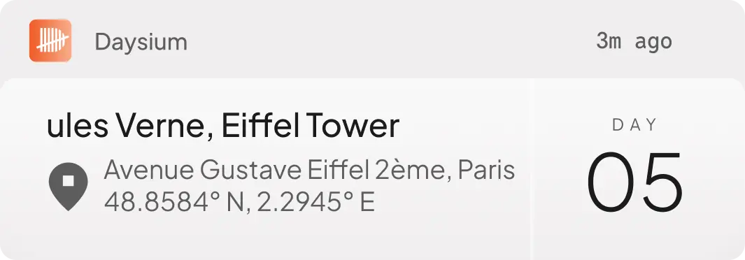 Product mock — Daysium Mobile location card for the Eiffel Tower, day 05.