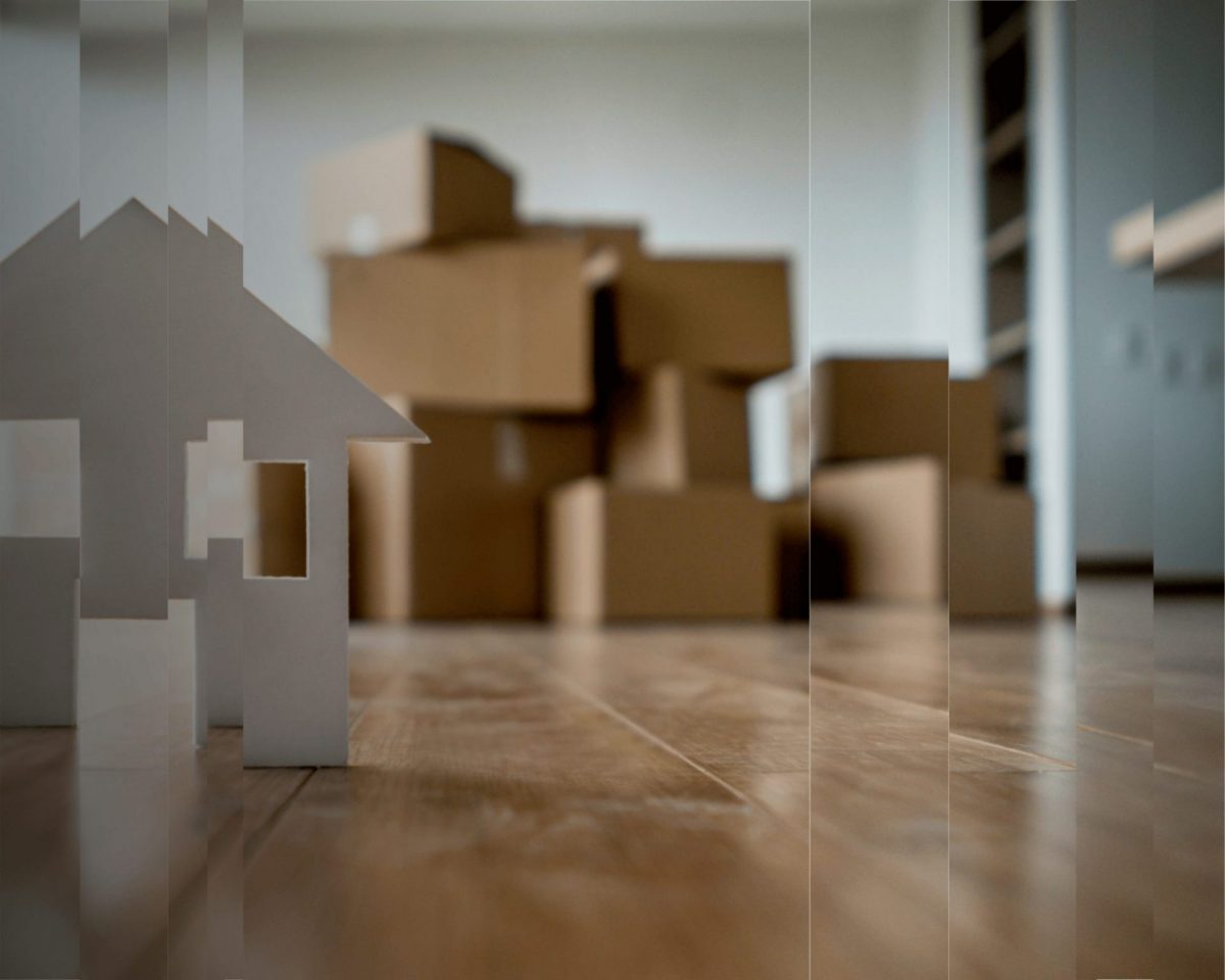 A picture of cardboard boxes representing the stresses of moving countries.