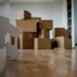 A picture of cardboard boxes representing the stresses of moving countries.