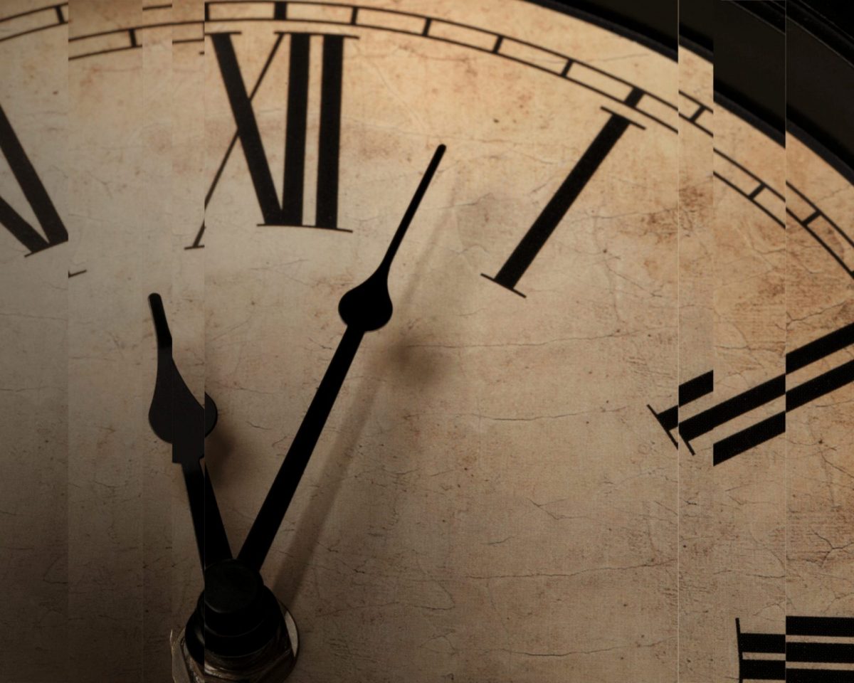 A distorted picture of a clock showcasing time.