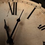 A distorted picture of a clock showcasing time.